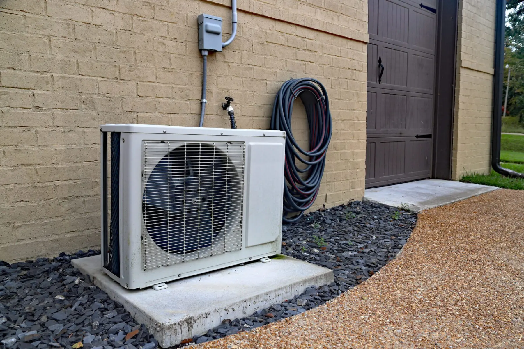 A wall-mounted ductless mini-split indoor head installed in a Massachusetts home.